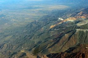 green slopes in the andes mountains in south america