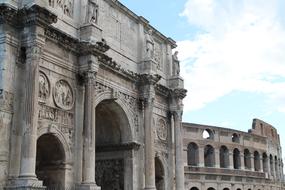 facade of the Colosseum in Rome against the backdrop of clouds