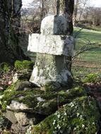 old stone cross in the cemetery