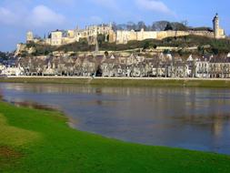 Beautiful and colorful ChÃ¢teau De Chinon on the hill, near the water in France