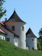 royal medieval castle on a blue sky background