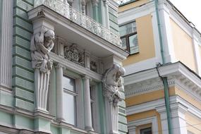 sculptures on the facade of a building in Moscow