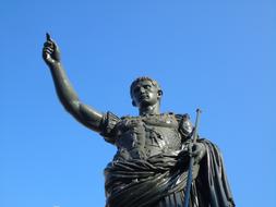 Cesar Statue against a clear blue sky