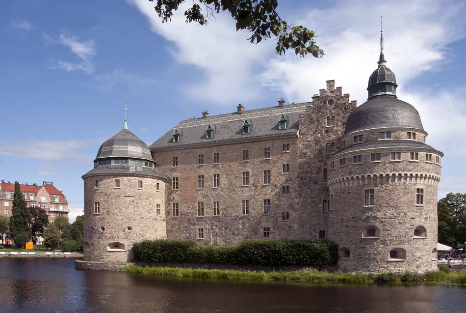 Castle among the water moat and plants in Swden