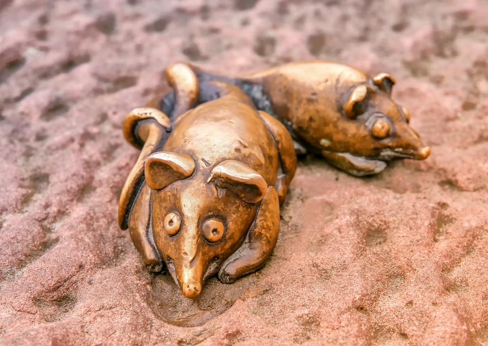 Beautiful metal mice figures on the sand in Heidelberg, Germany