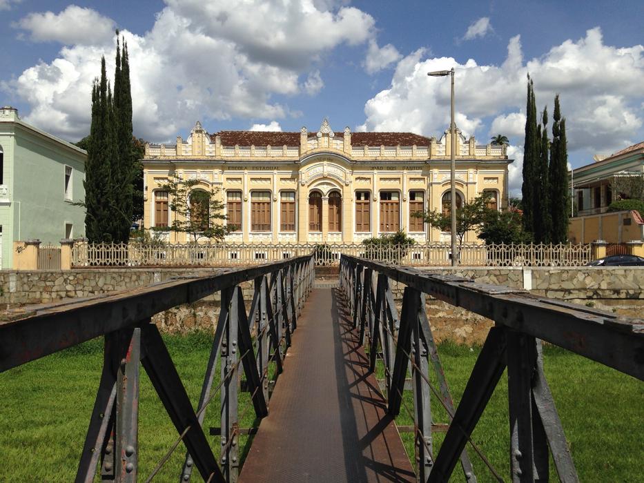 Beautiful mansion with the bridge, among the green plants, in Minas, Brazil
