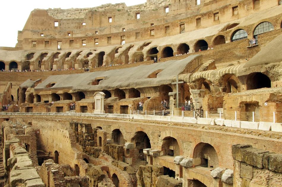 stands on the ruins of the colosseum in rome