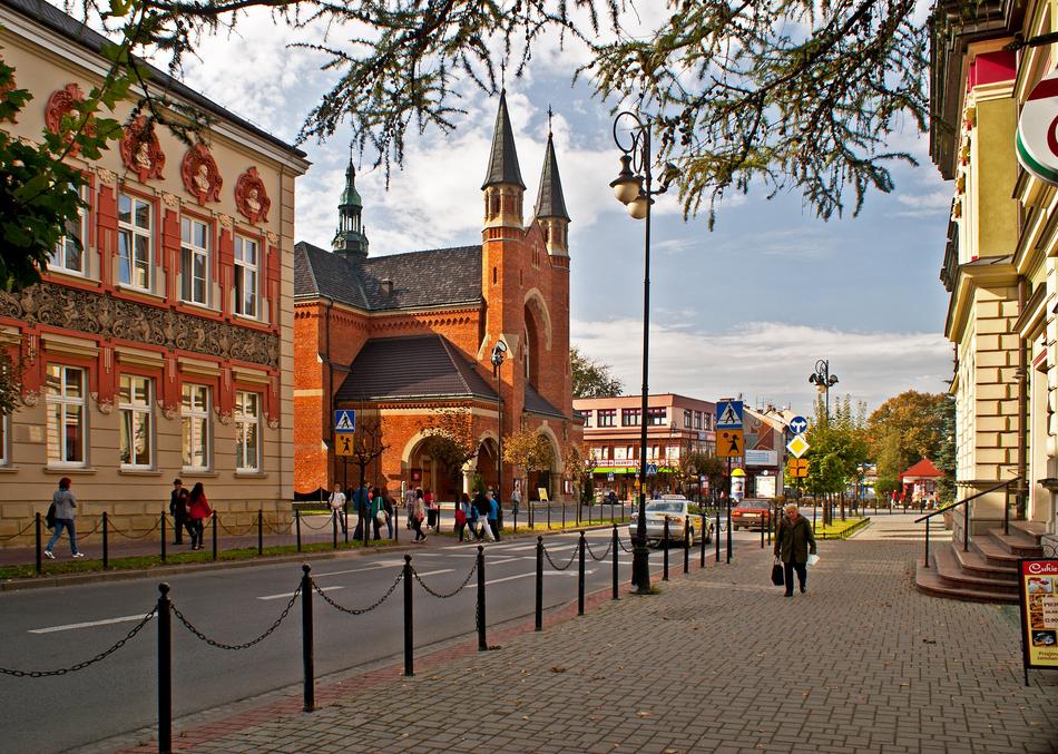 People, among the colorful and beautiful buildings in Malopolska, Poland