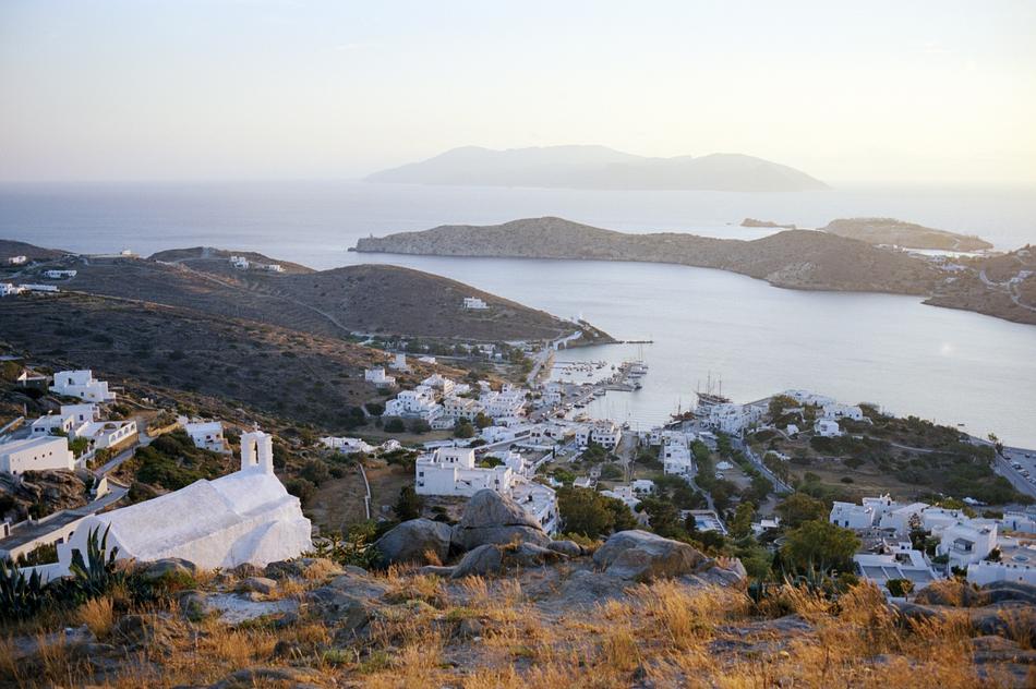 white Church on rock at coastal village,Greece, cyclades, ios