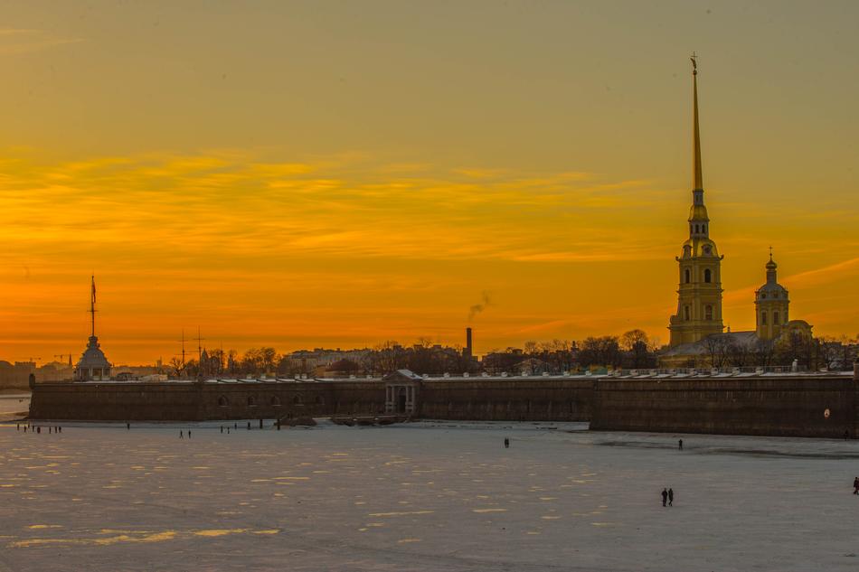 yellow sky over winter saint petersburg