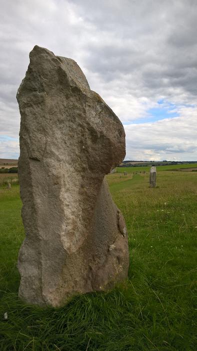 Beautiful landscape with the megaliths, on the green and yellow field