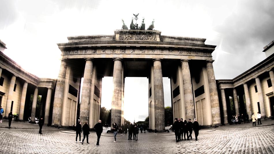 people near the brandenburg gate in berlin