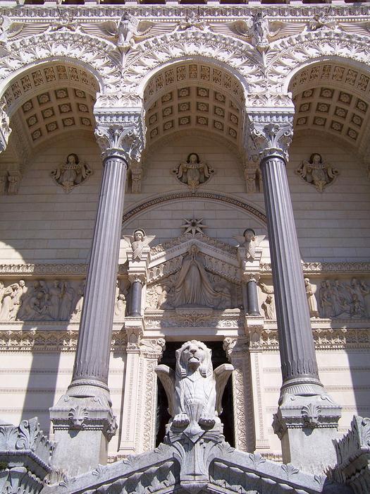 Beautiful and decorated basilica with columns and statue in Lyon, France