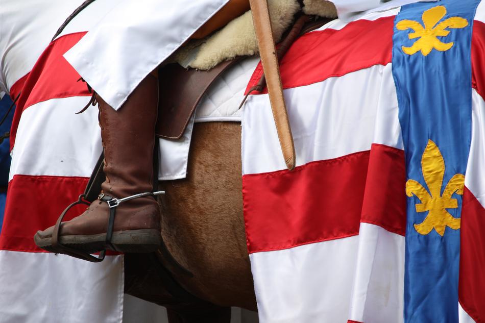 Foot of the knight of the brown horse, with the colorful flags, Chateauneuf-En-Auxois, France