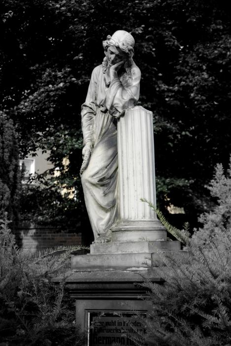 sculpture on the grave in the cemetery