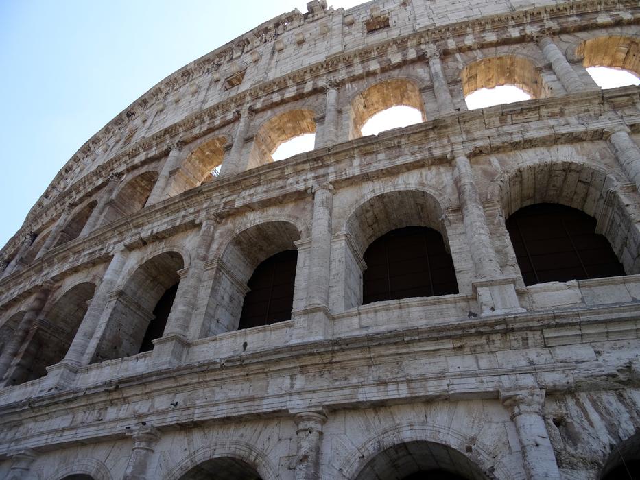 antique colosseum with arcades in rome