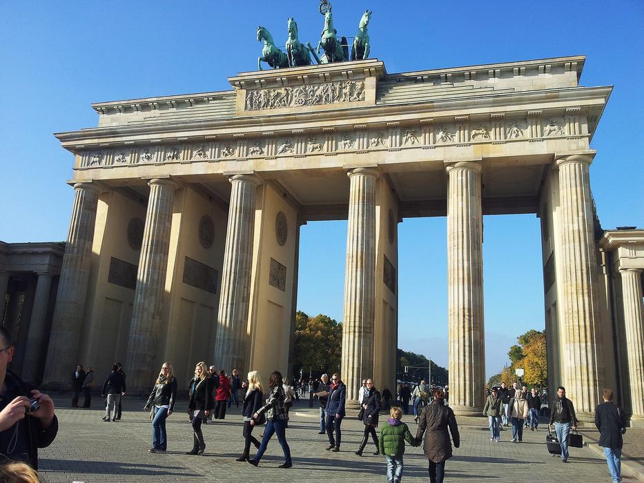 People, near the beautiful Brandenburg Gate in Berlin, Germany