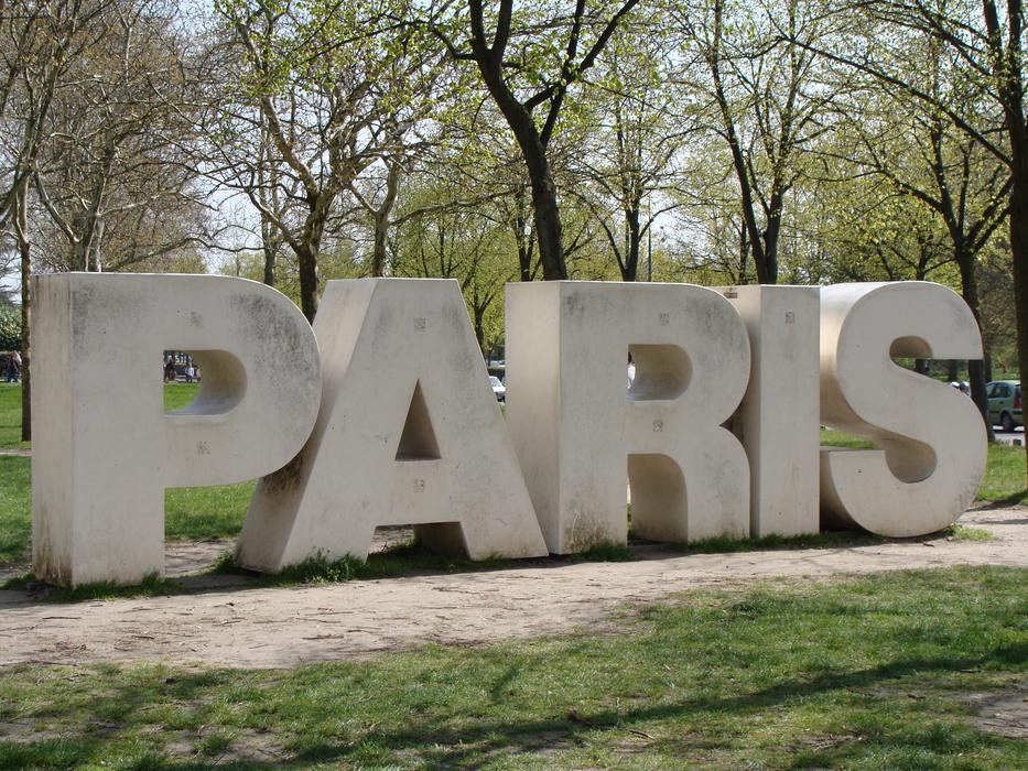Paris text statue in park