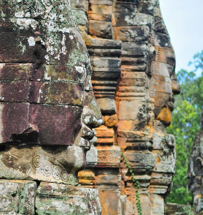 Beautiful and colorful Angkor Wat, among the green trees in Cambodia