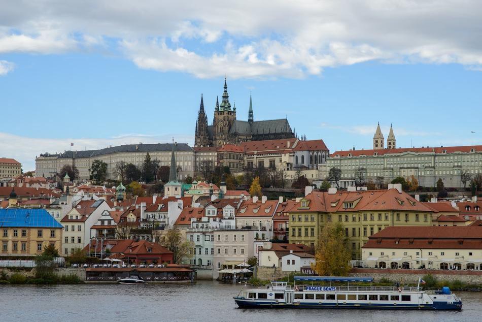 view of prague on the river bank