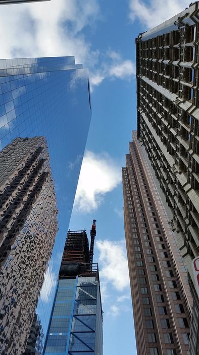 Buildings in Philadelphia, Pennsylvania, USA, under the blue sky with white clouds