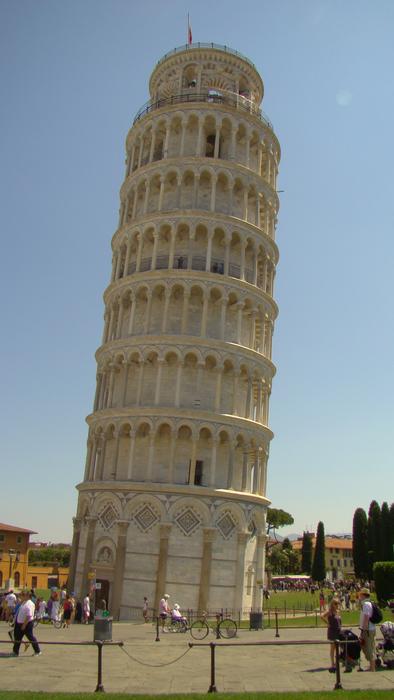 Beautiful landscape with the Pisa Tower, among the plants, in Pisa, Italy