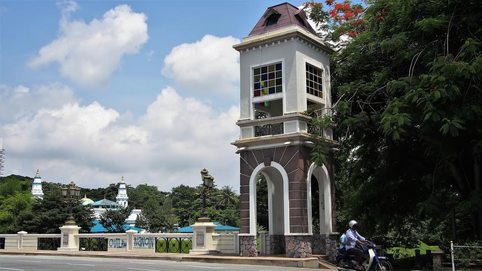 architectural tower near a tree in malaysia