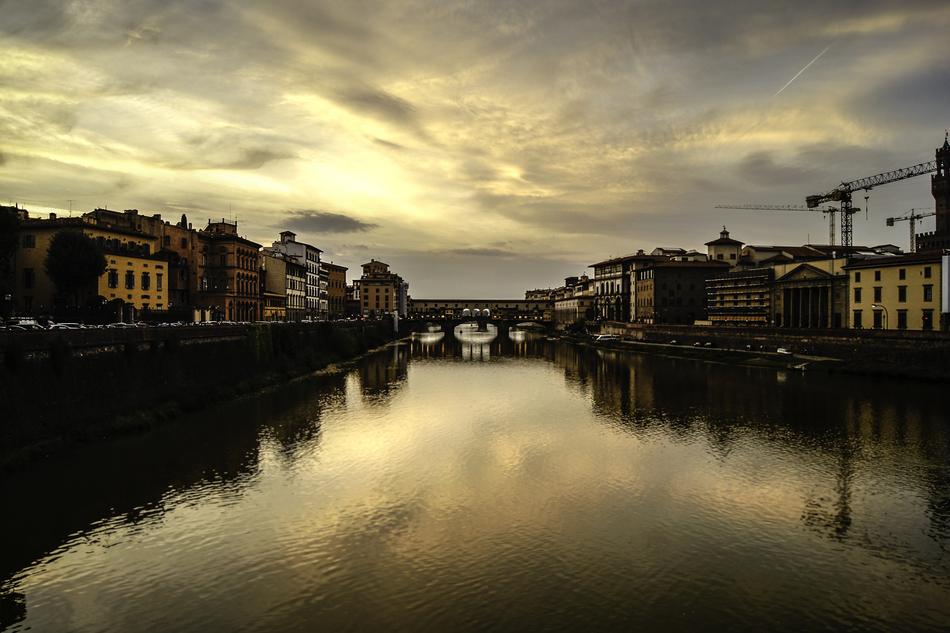 distant view of Ponte Vecchio at cloudy twilight