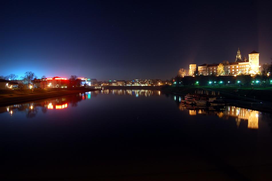 distant view of wawel castle at night