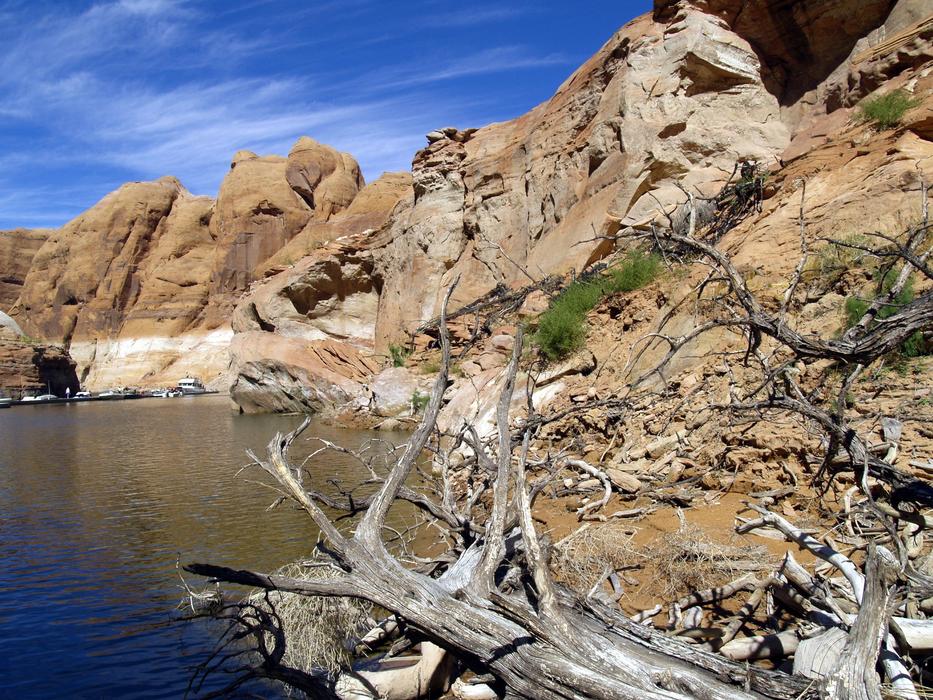 Beautiful and colorful rocky shore of Lake Powell in Arizona, USA, in sunlight