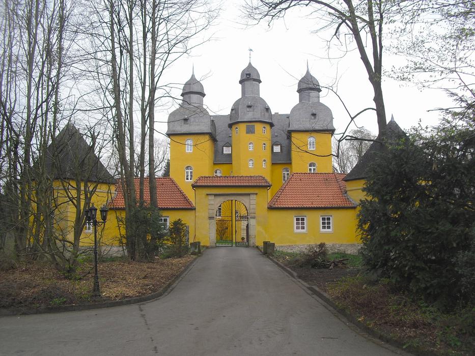 yellow palace building in Holte, Germany