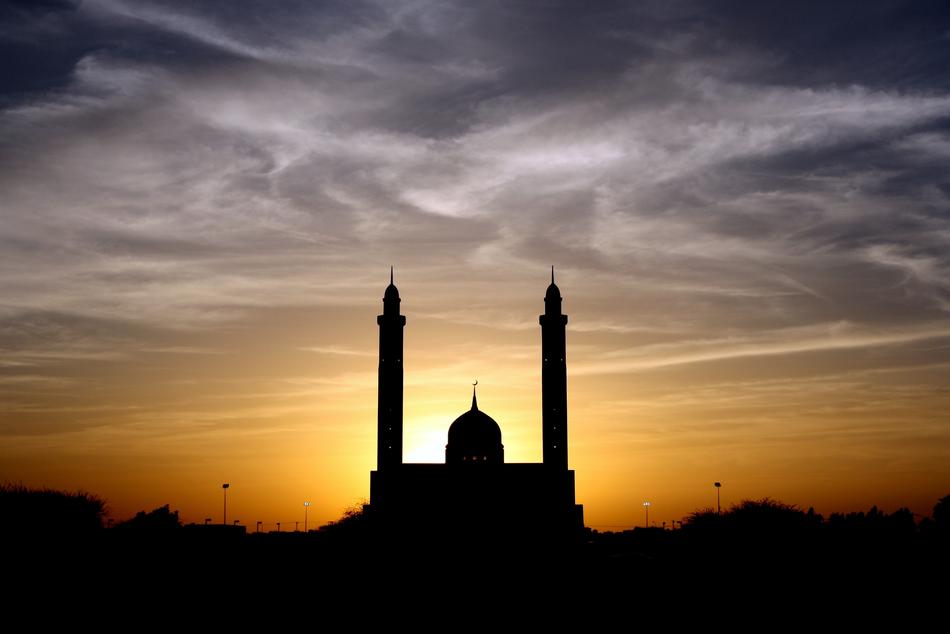 silhouettes of religious architecture at sunset