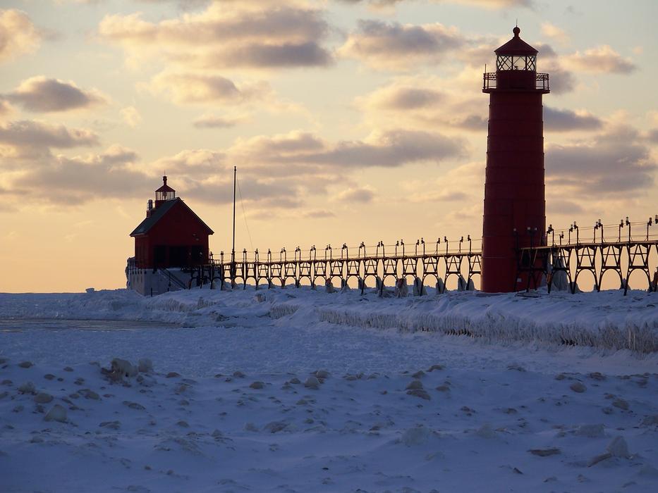 Lighthouse In Winter Landscape