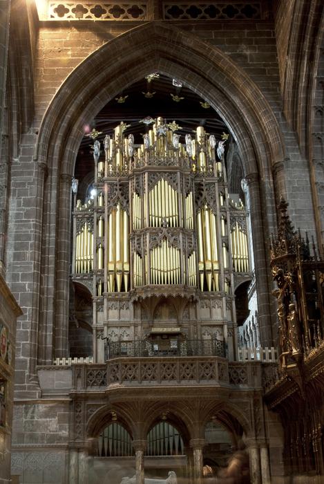 beautiful organ with gilded tubes in old Cathedral