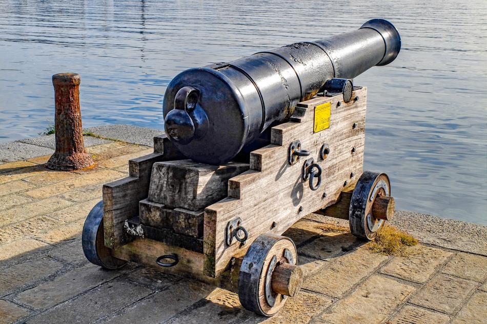 Shiny cannon on the coast of La Spezia, Italy, in sunlight