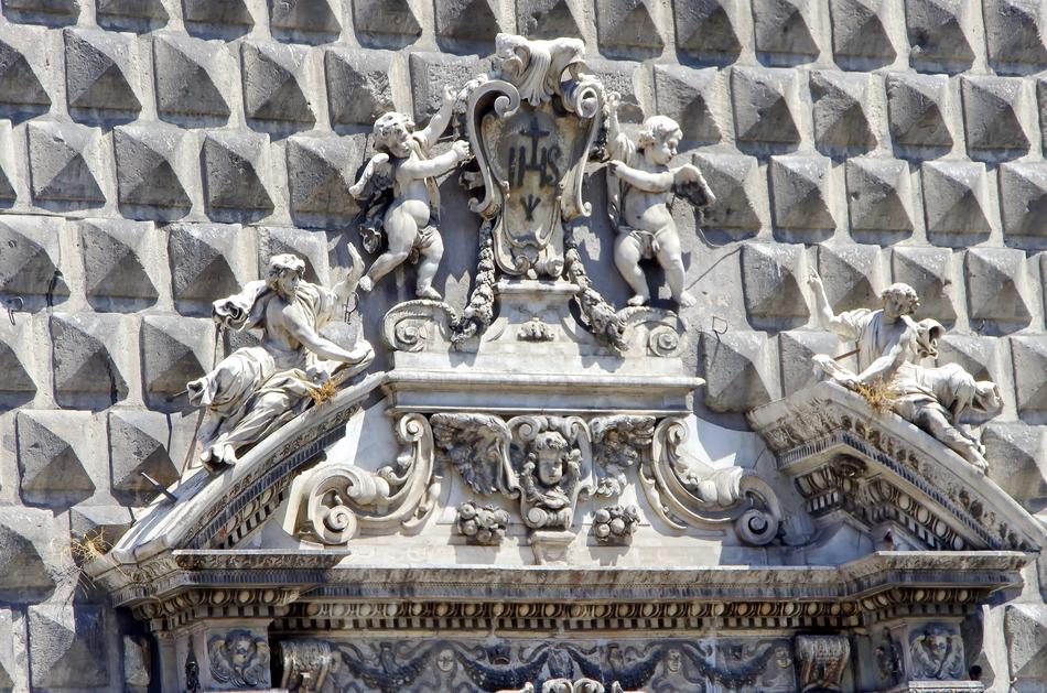 Beautiful statues of the Gesu Nuovo in Naples, Italy, in sunlight