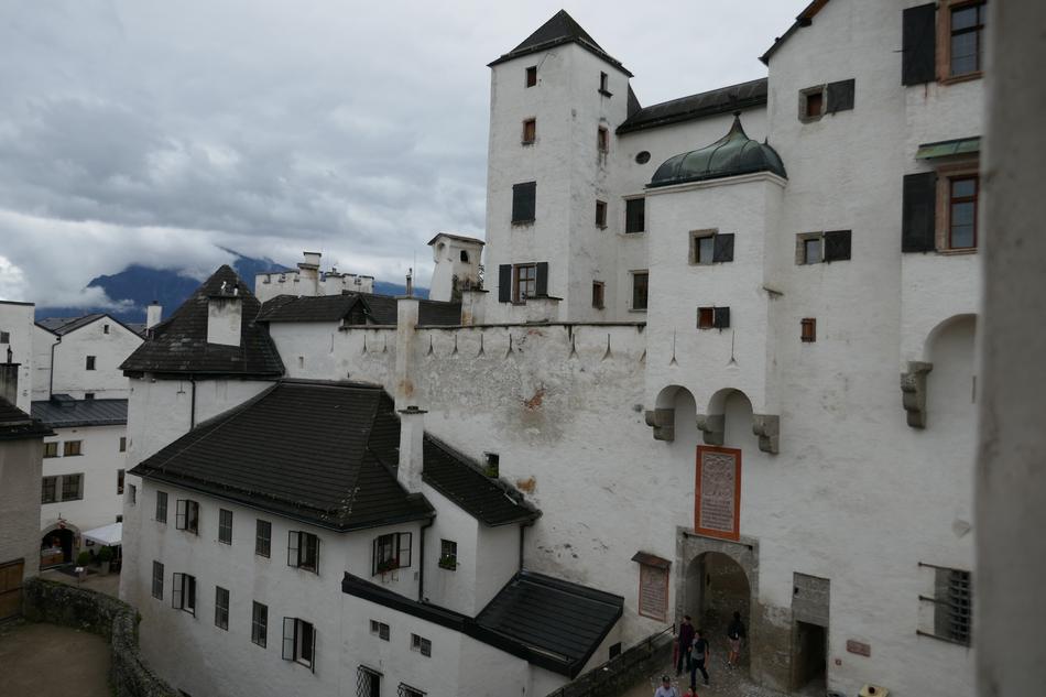 Beautiful castle with tower in Salzburg, Austria, under the sky with clouds