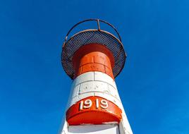 red Lighthouse Tower and blue Sky