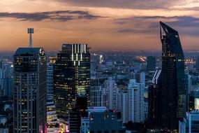 Skyscrapers with colorful lights in Bangkok, Thailand