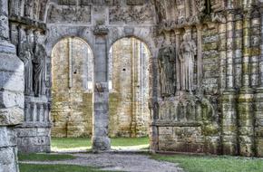 arched doorway of ruined gothic Church, france, seine and marne