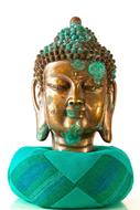 bronze and green Sculpture of Buddha Head