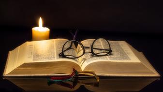 Book Bible Open and candle