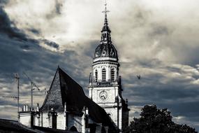 dramatic sky over church spire