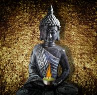 stone statue of sitting Buddha