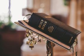 bible in church close up on blurred background