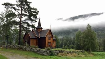 wooden church in the beautiful nature of norway