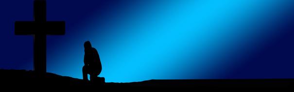praying silhouette on the blue background