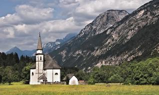 Landscape of church near The Alps Mountains