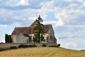 old church in the middle of a field in france