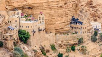 Beautiful Monastery Israel, on the hills, with the green plants, in the desert